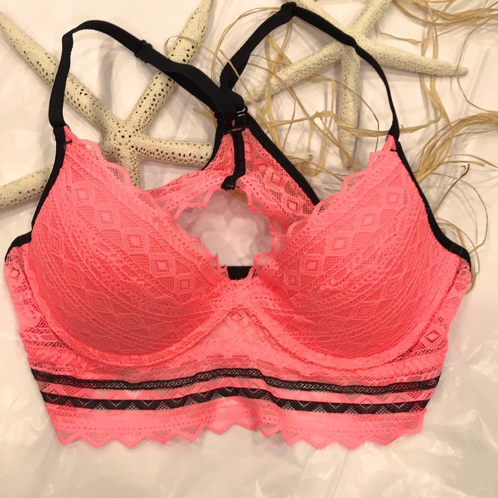 she is PINK. S/P beautiful deep coral/pink.BLACK STRAPSW BLACK going thru lace💕